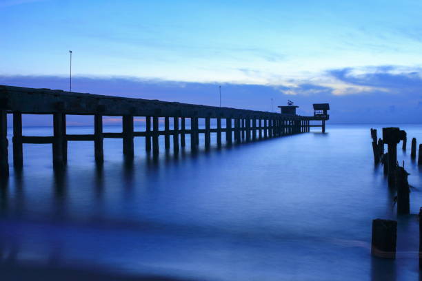 istock sunset landscape twilight time beautiful at bridge harbor and sea in evening 674874792