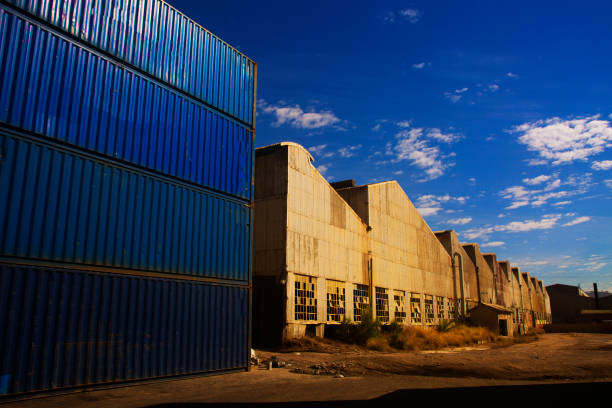 istock Ship containers stored at old factory yard 674888820