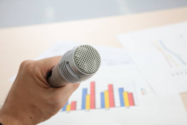 istock Close up old microphone in conference room 674888830