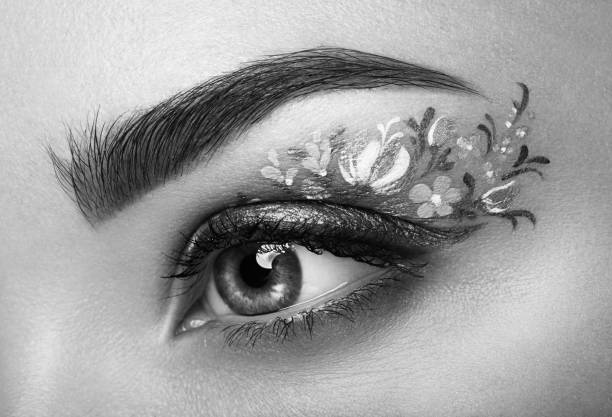 istock Eye makeup girl with a flowers 674889016