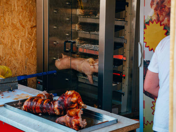 istock Roast pork on the grill. Outdoor kitchen 674889046