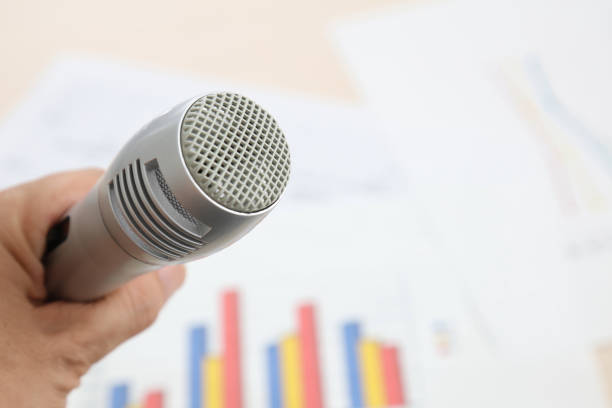 istock Close up old microphone in conference room 674889160