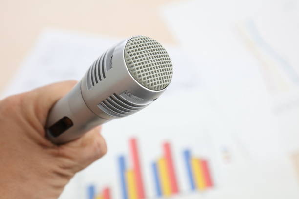istock Close up old microphone in conference room 674889290