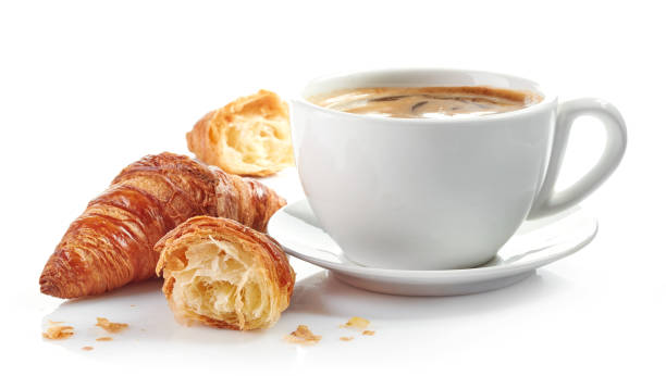istock cup of coffee and croissants 674891582