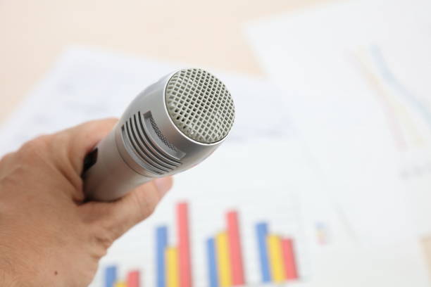 istock Close up old microphone in conference room 674892264