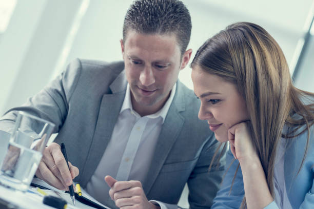 istock Two young designers working together in an office 674910086