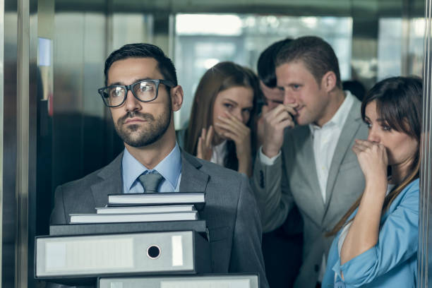 smelly businessman affecting his coworkers in an elevator - fedorento imagens e fotografias de stock