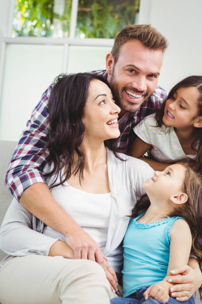 istock Happy family with daughters 674927596