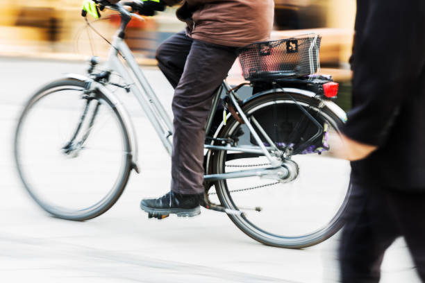 istock cyclist in the city in motion blur 674930976