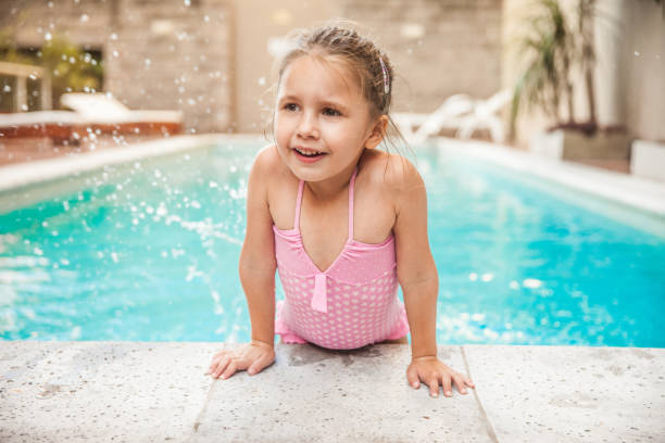istock Happy Girl Swimming in Spa Pool 674937518