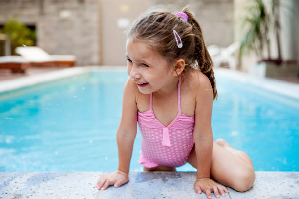 istock Happy Girl Swimming in Spa Pool 674937524