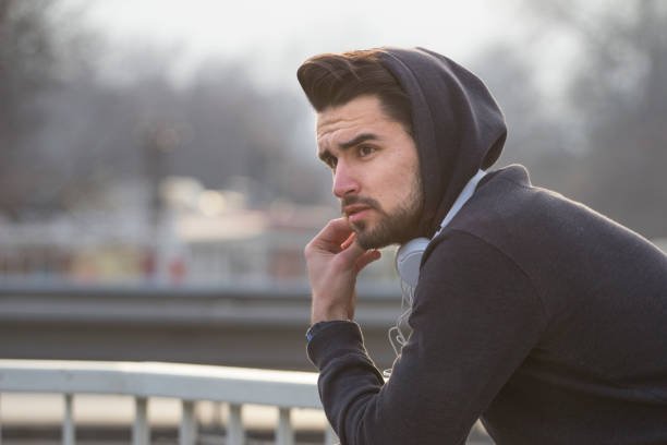 istock Jogger leaning on the fence 674941046