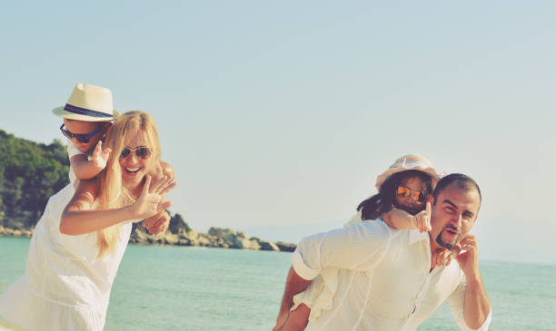 istock Happy Family on the Beach 674952742