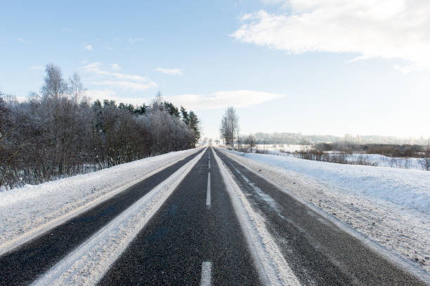 istock empty road in the countryside in winter 674955682