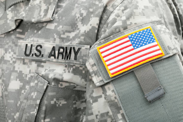 Close up studio shot of USA flag and U.S. ARMY patch on solders uniform stock photo
