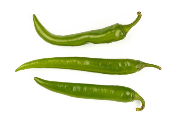 istock Green fresh jalapeno peppers close up on white 674963094