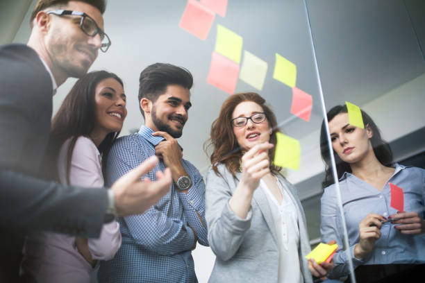 istock Collaboration and analysis by business people working in business office 674969966