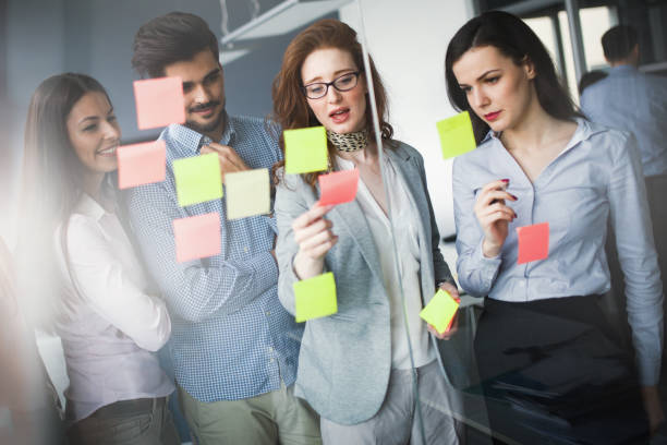 istock Collaboration and analysis by business people working in business office 674969978