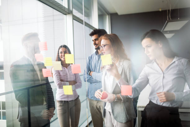 istock Collaboration and analysis by business people working in business office 674969980
