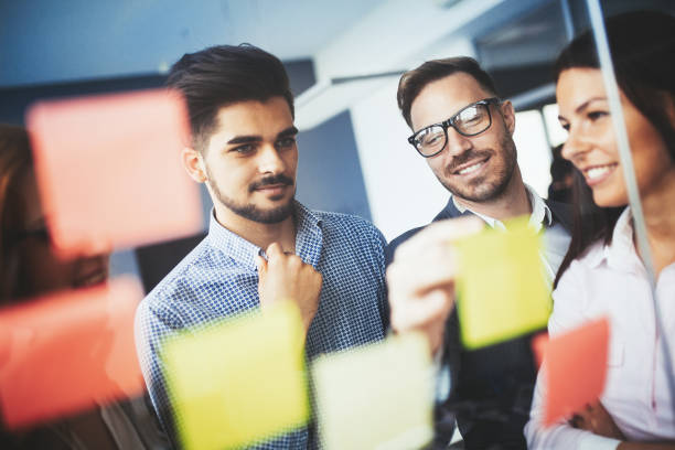 istock Collaboration and analysis by business people working in business office 674970120