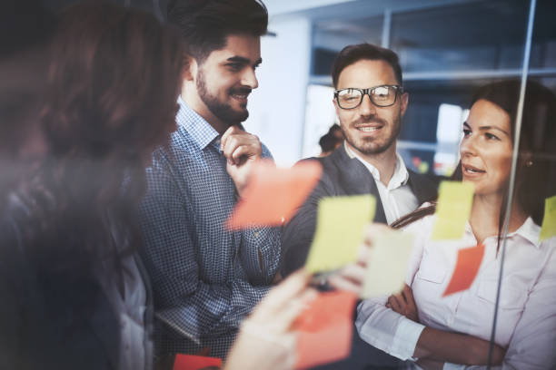 istock Creative professional business people working on business project in office 674970126