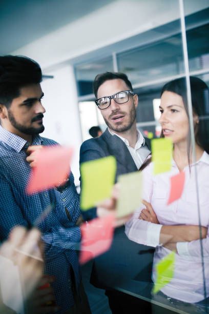 istock Creative professional business people working on business project in office 674970176