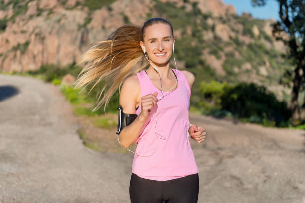istock Cute sportswoman jogging 674980896
