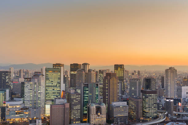 istock City office building downtown with sunset tone background 674981206