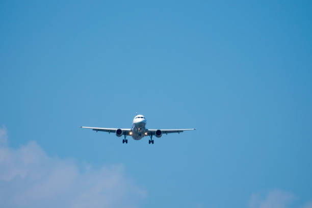 istock Aircraft landing from the blue sky 674985100