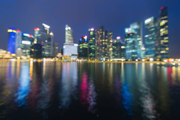 istock Blurred bokeh city of Singapore light night view 674986798