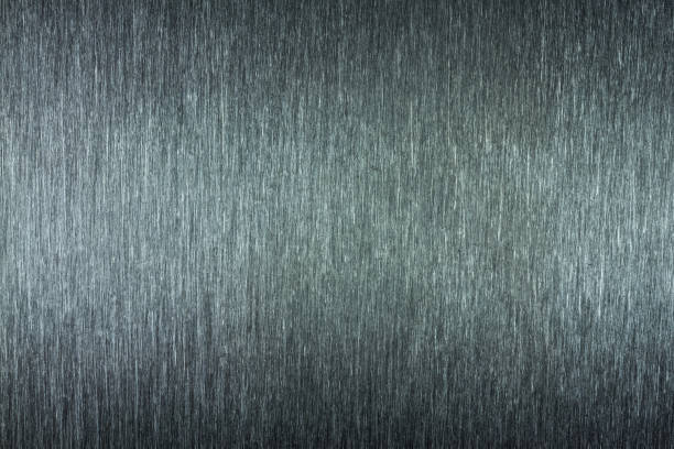 istock Background of scratched metal surface close up 674987546