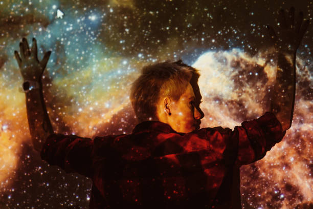istock Young beautiful woman lost  in space around stars 674992880