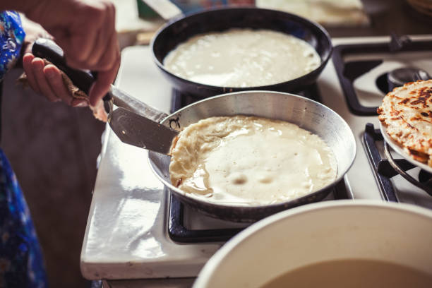 istock Grandmother making pancakes 674994994