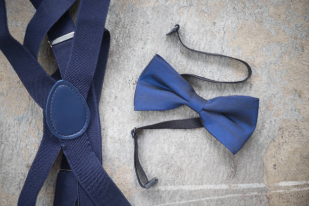 istock close up blue bow ties for groom, top view 674997526