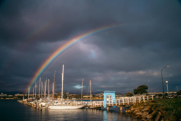 Rainbow over the boats in a Wellington harbor