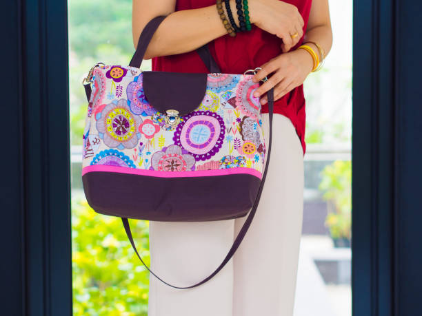 istock Woman with batik bag 675003860