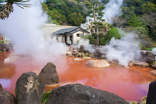 Hot spring water (Hells), red pond in Umi Jigoku at Beppu, Oita-shi, Kyushu, Japan