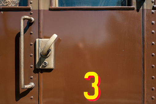 Old train wagon third class cabin door