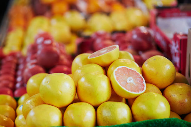 Fresh organic grapefruits on farmers market in Paris, France