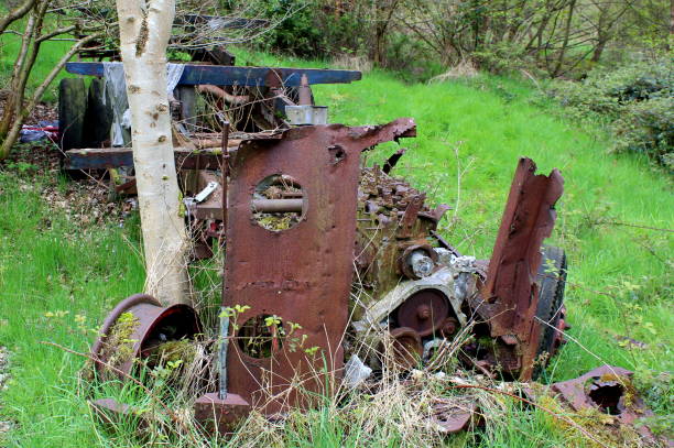 istock Abandoned derelict lorry in wooded field, UK 675023988