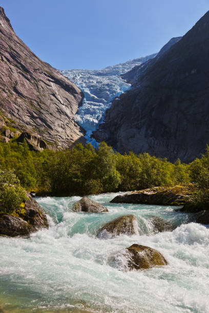 istock Waterfall near Briksdal glacier - Norway 675030128