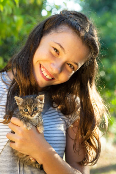 istock Young child loving her cat 675038858