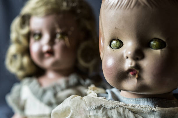 Staggered Antique Doll creepy doll stock pictures, royalty-free photos & images