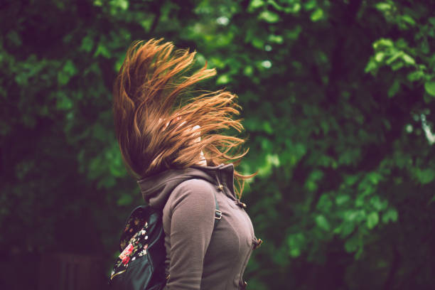 istock Young happy woman enjoying in day 675054834