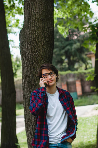 istock A man walks and talks on phone 675058170