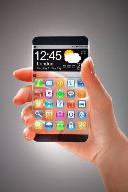 istock Smartphone with transparent screen in human hands. 675059102