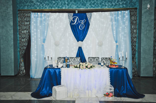 istock Festive hall decorated with blue and white fabrics 7578. 675060252