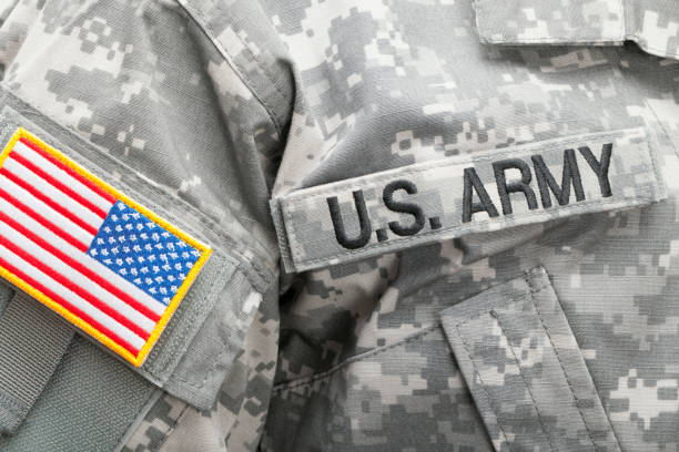 istock US flag and U.S. ARMY patch on military uniform - studio shot 675062714