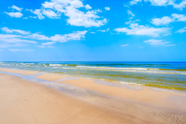 istock Sea waves on white sand Debki beach, Baltic Sea, Poland 675065002