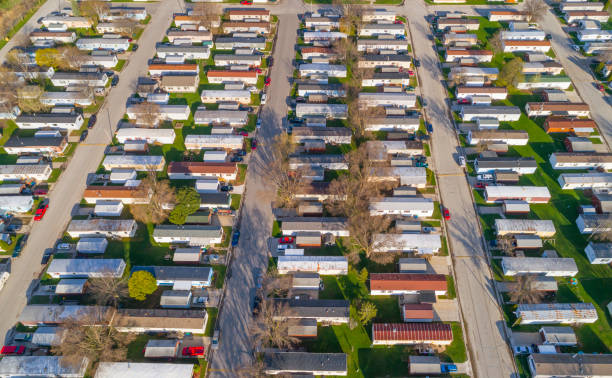 istock Aerial view looking down on vast trailer park, mobile homes 675065716